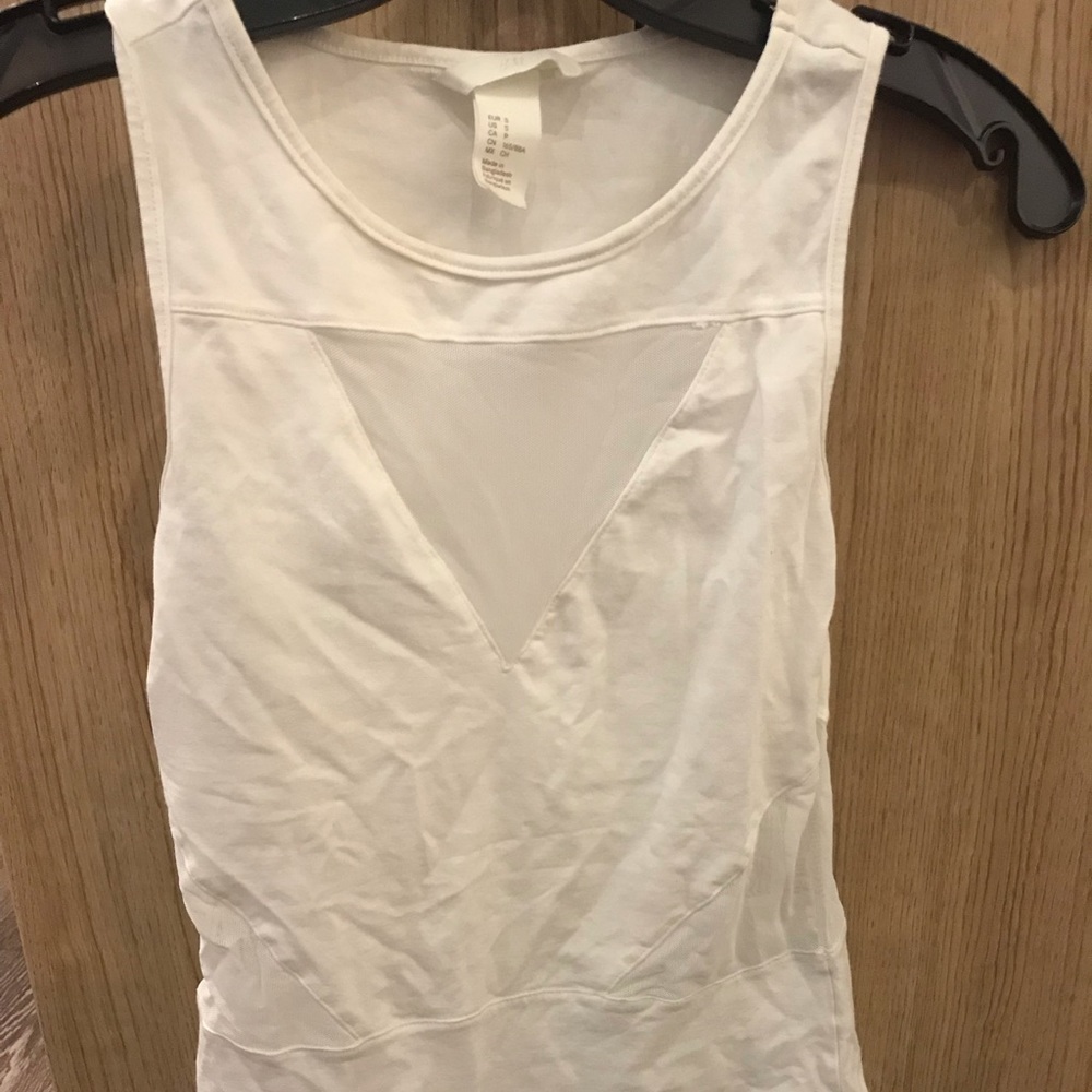 White body suit with mesh cut outs